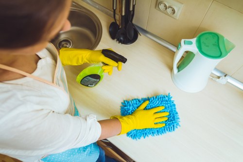 Deep cleaning a Fulham home kitchen with detailed grease and surface removal